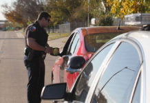 If you are walking down the road and a police officer stops you to ask you for your ID, must you show him?